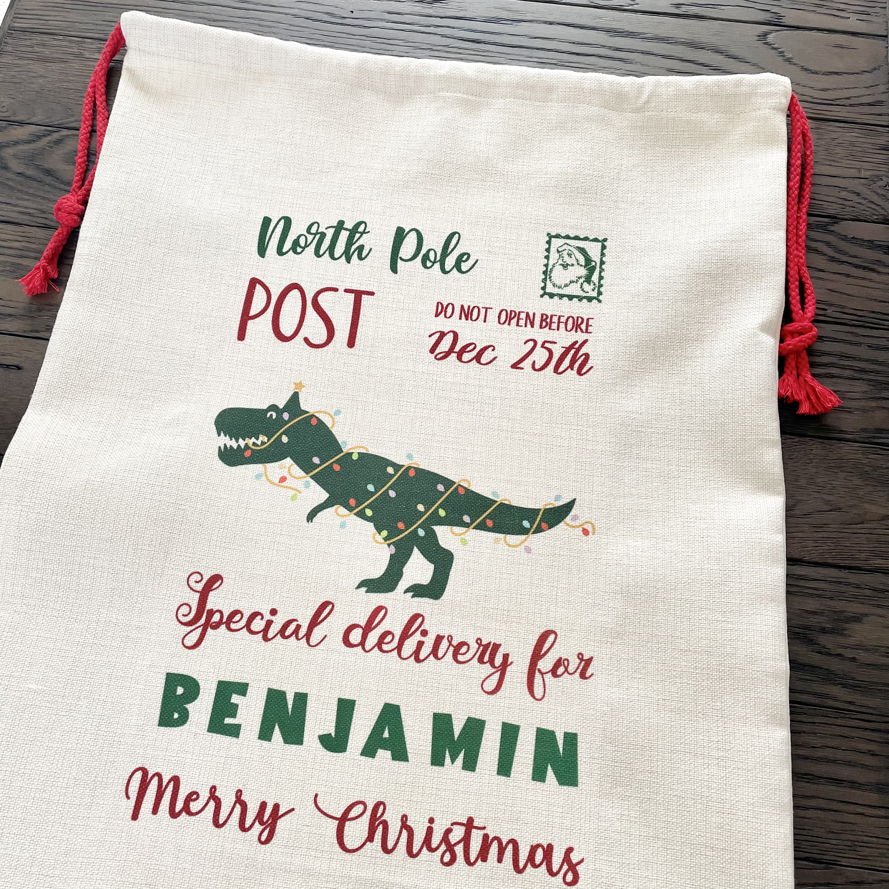 Personalised Christmas Sack From Santa Claus with dinosaur t-rex